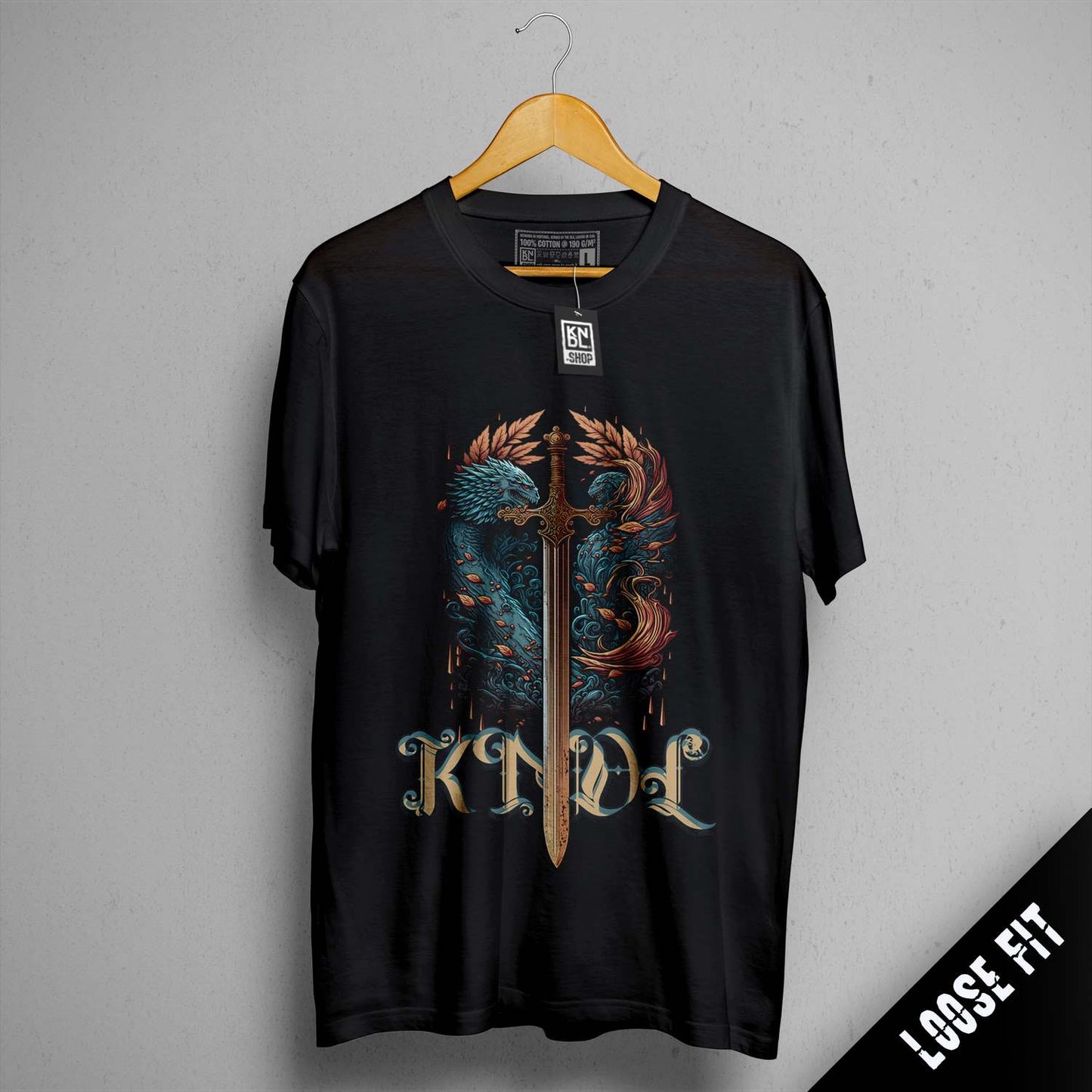 a black t - shirt with a sword on it