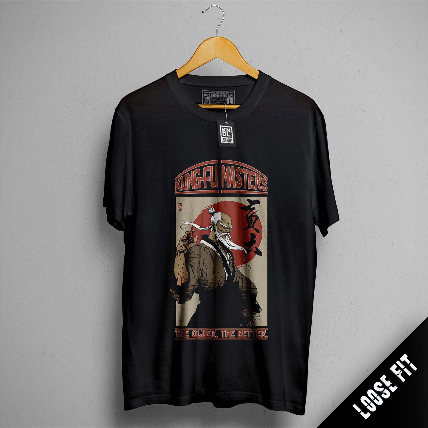 a black shirt with a picture of a man holding a gun