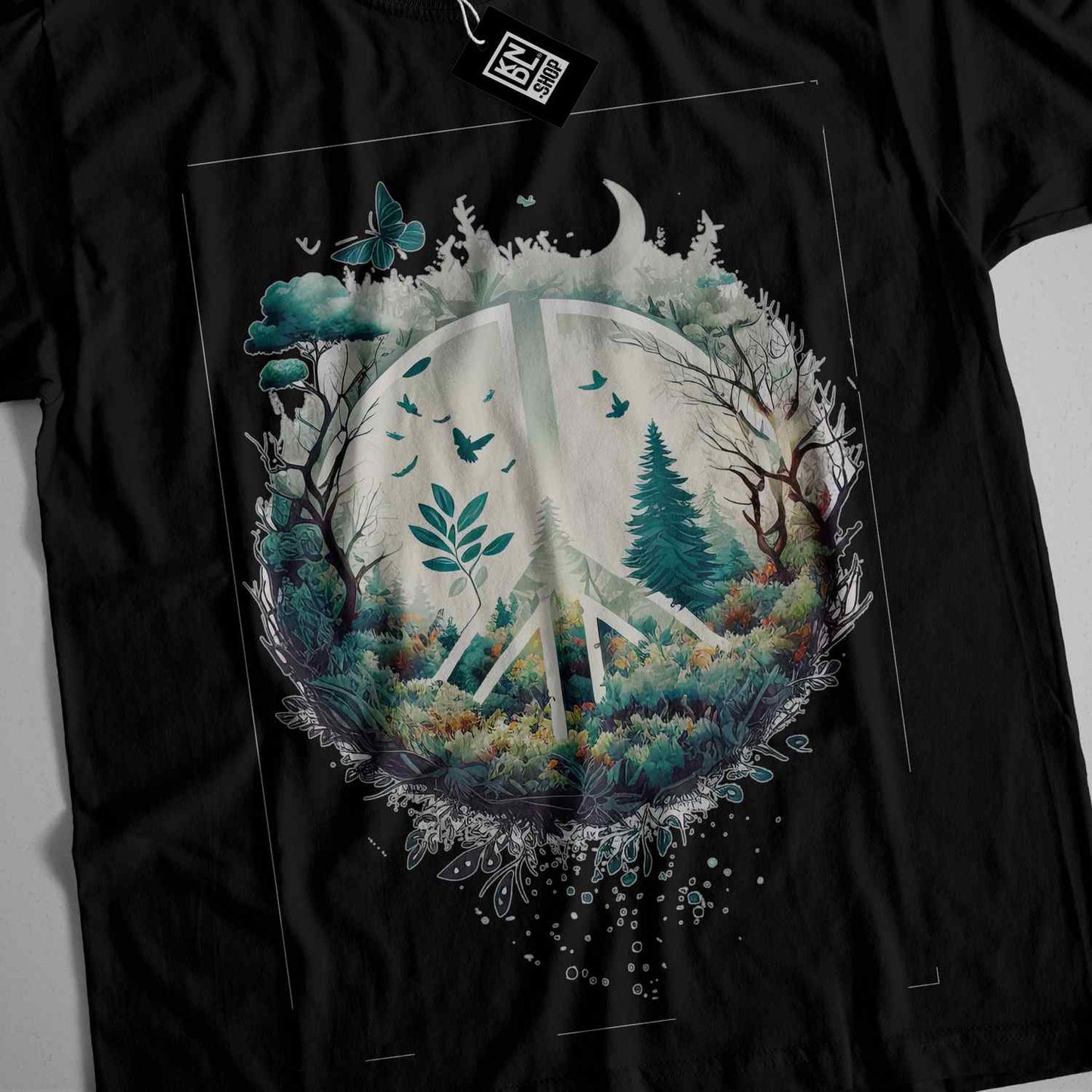 a black t - shirt with a picture of a forest