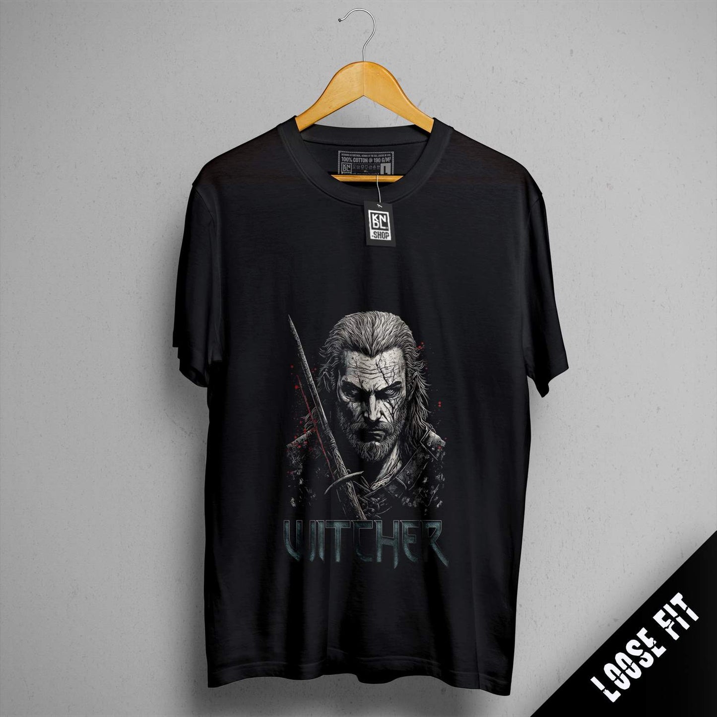 a black t - shirt with a picture of a man holding a sword