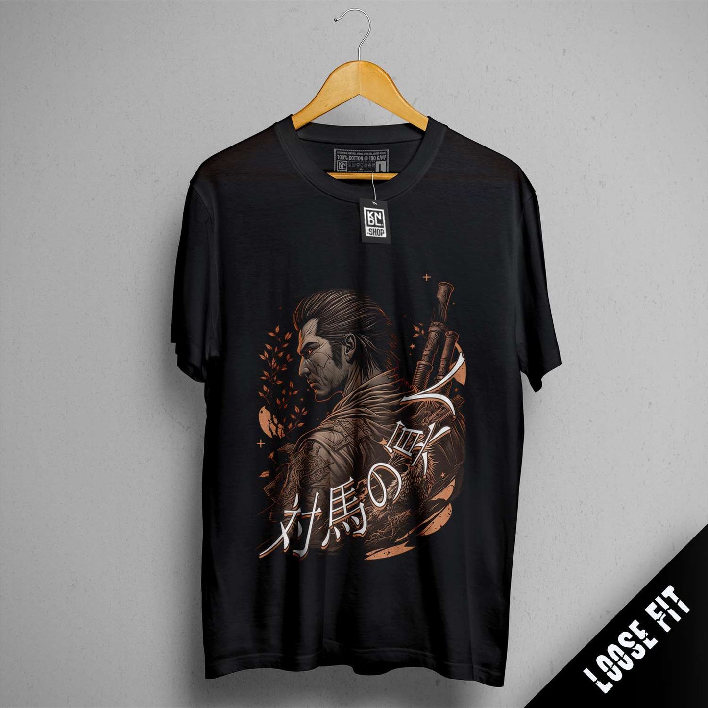 a black shirt with a picture of a man holding a gun