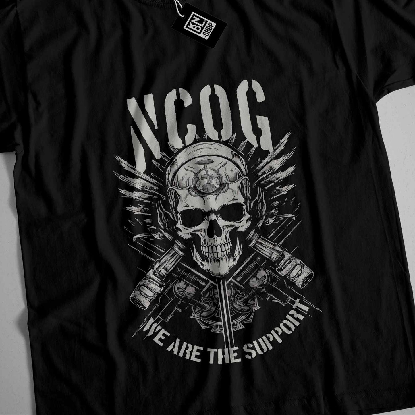 a black t - shirt with a skull on it
