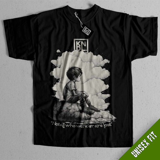 a black shirt with a picture of a boy sitting on a rock