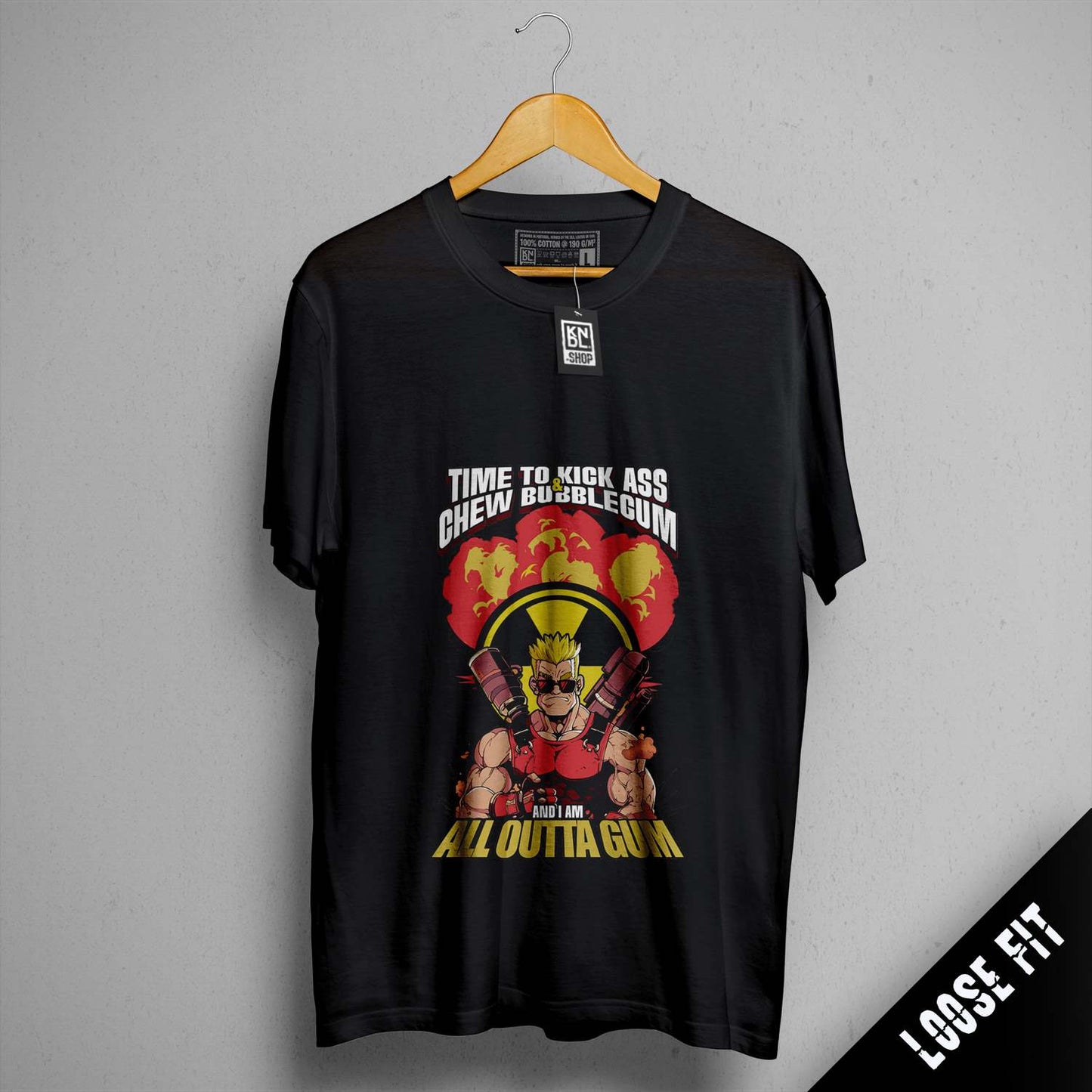 a t - shirt with a picture of a man holding a hammer