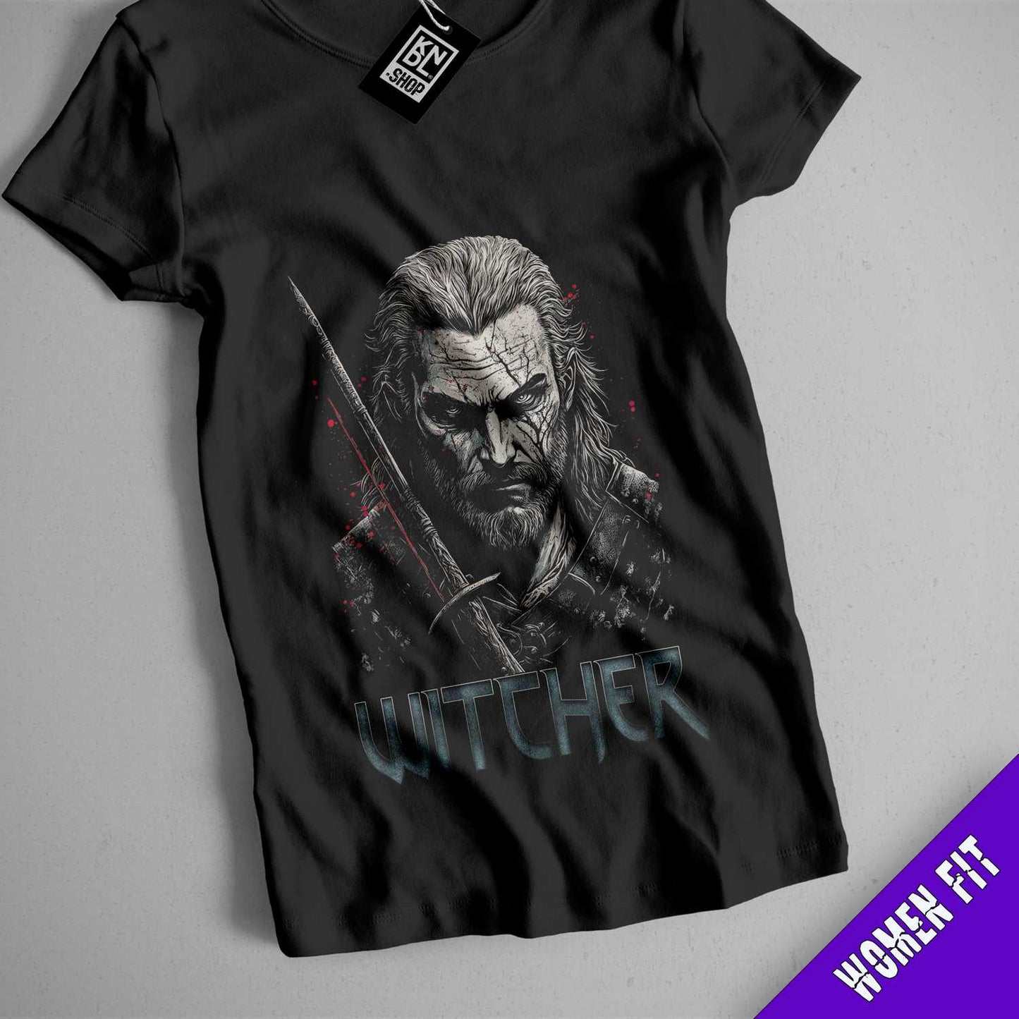 a black t - shirt with a picture of a man holding a sword