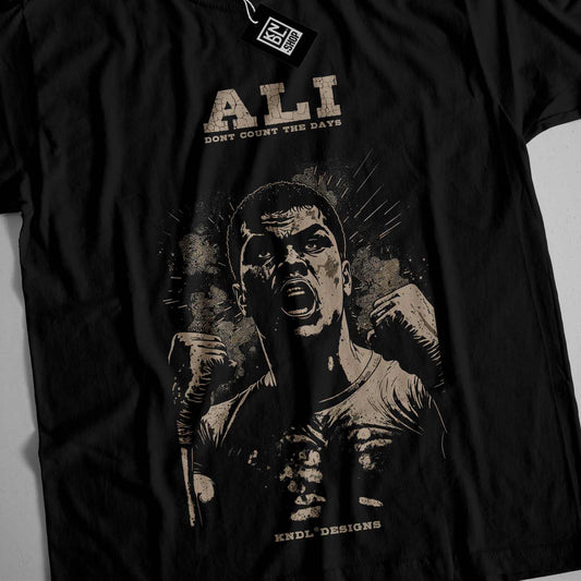 a black shirt with a picture of a man holding a baseball bat