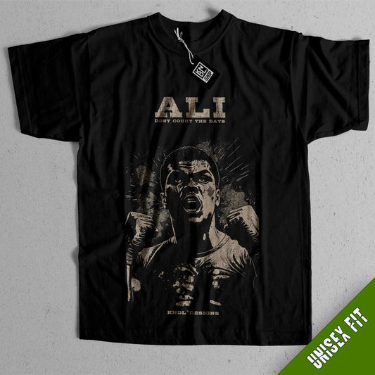 a black shirt with a picture of a man holding a gun