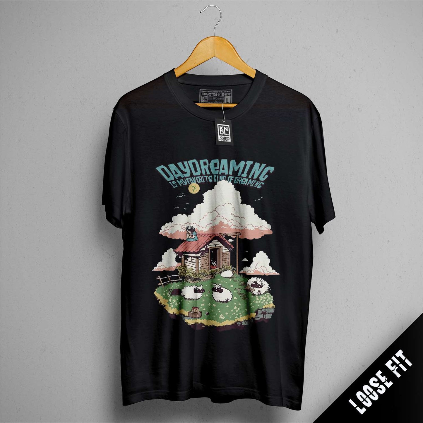 a black t - shirt with a picture of a house on it