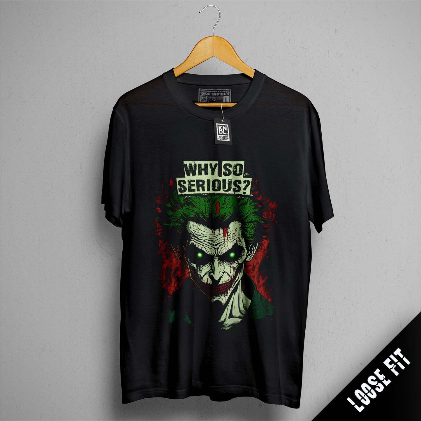 a black t - shirt with a picture of the joker on it