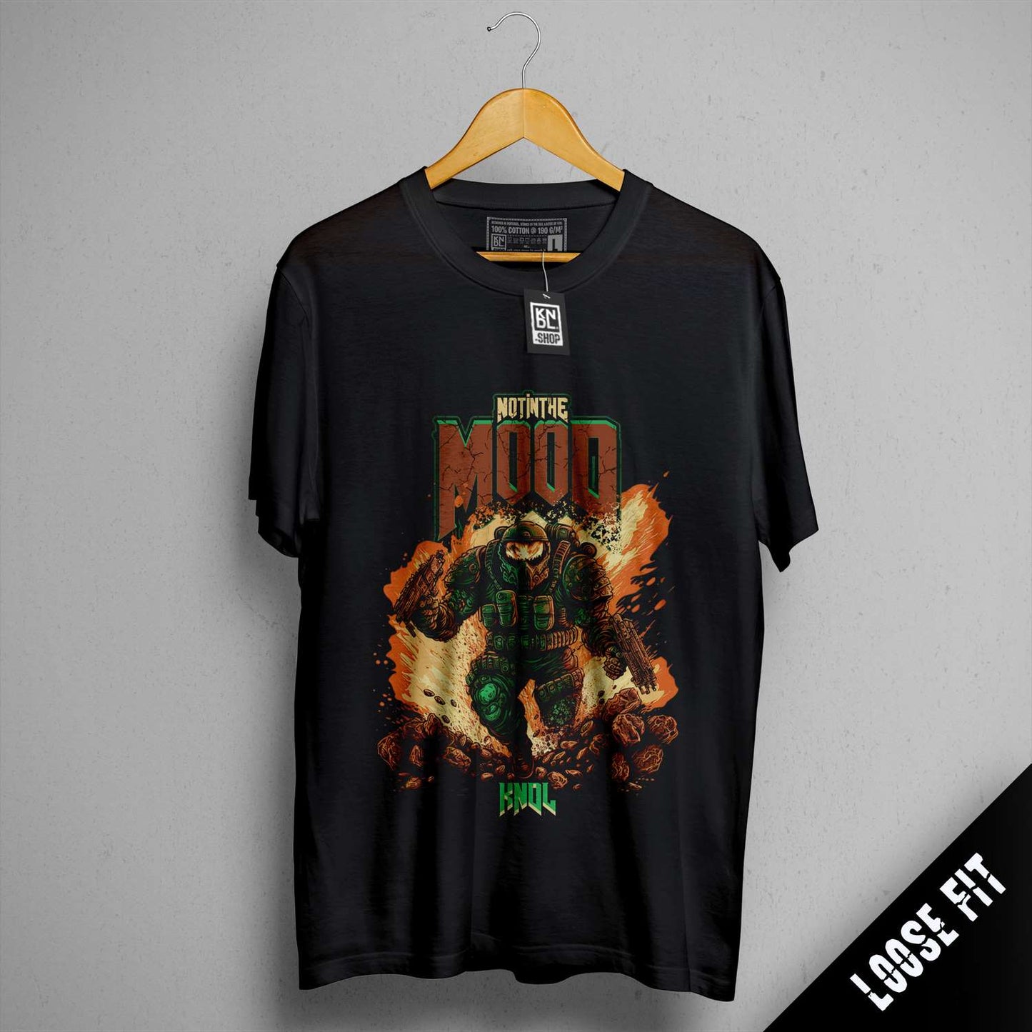 a black t - shirt with a picture of a man on it