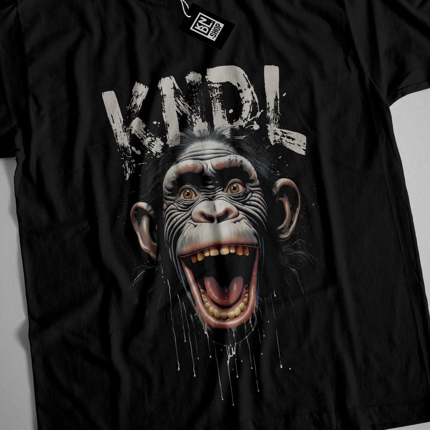 a black t - shirt with an image of a monkey on it