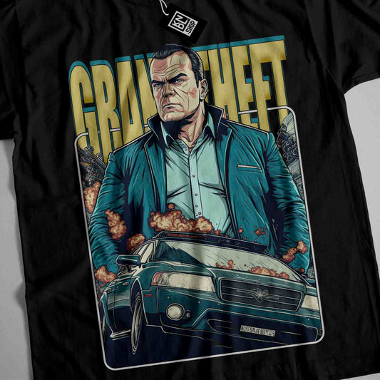 a black t - shirt with a picture of a man holding a car