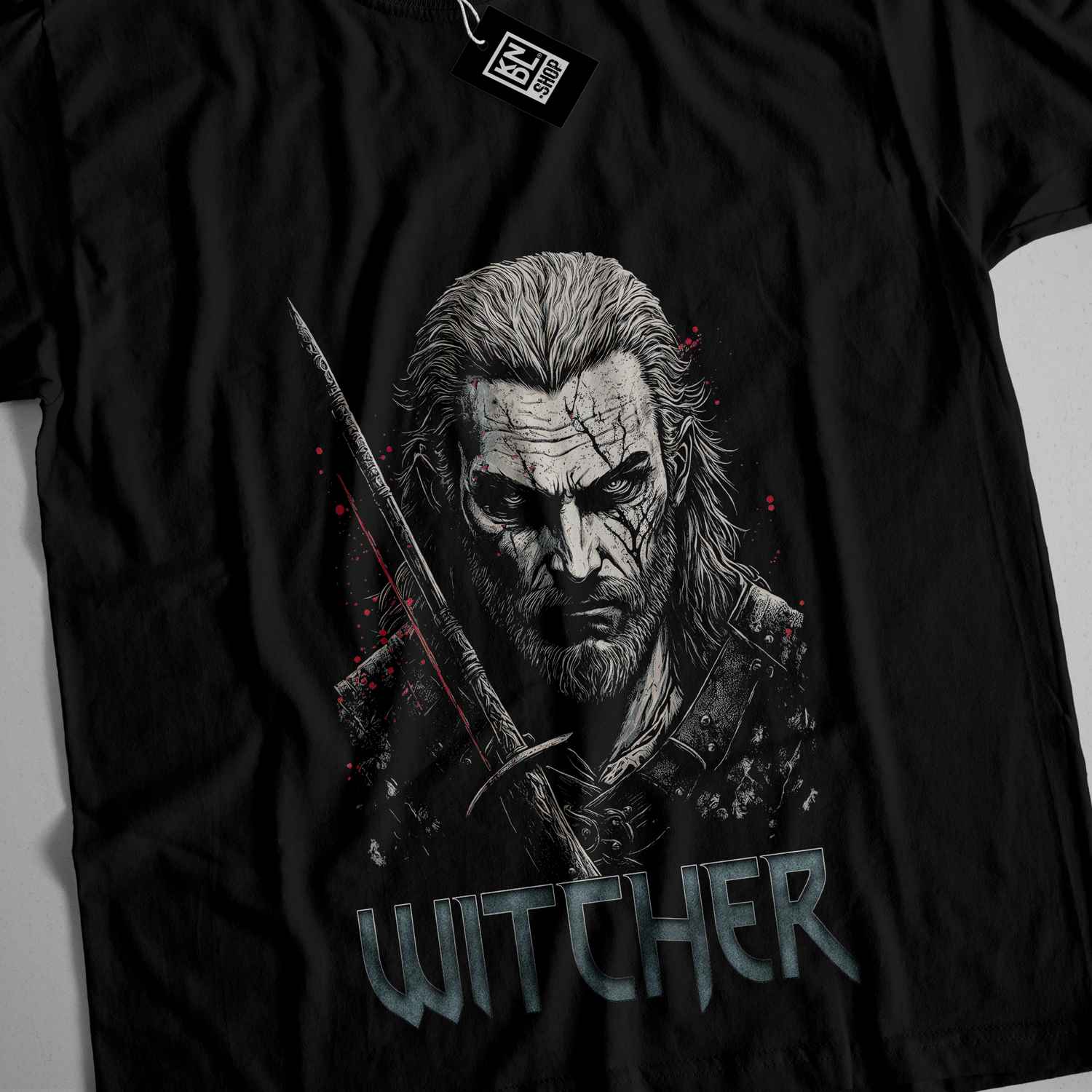 a black t - shirt with a picture of a man holding a sword
