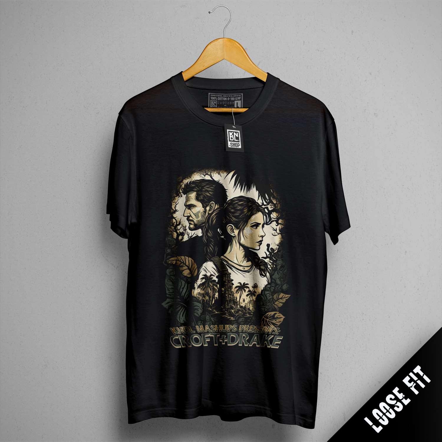 a black t - shirt with a picture of a man and a woman on it