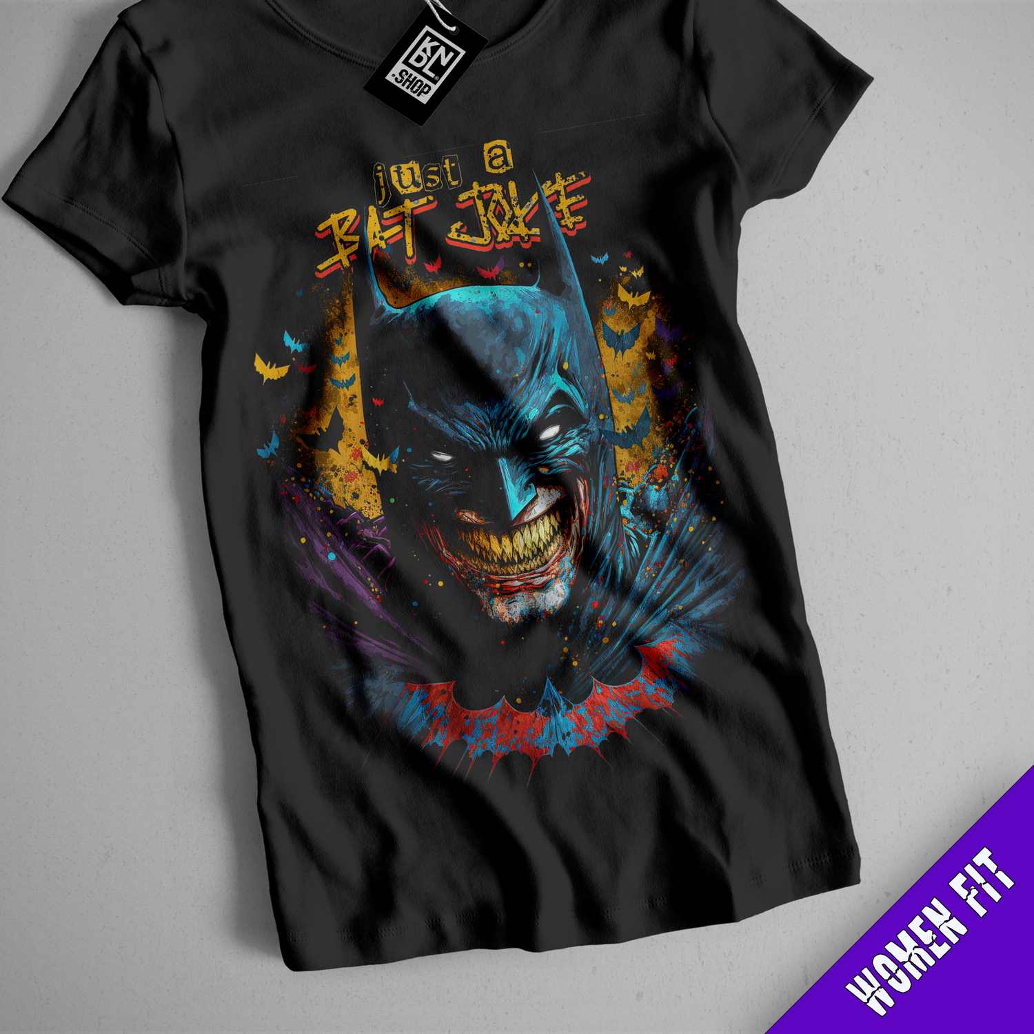 a batman t - shirt with a joker face on it