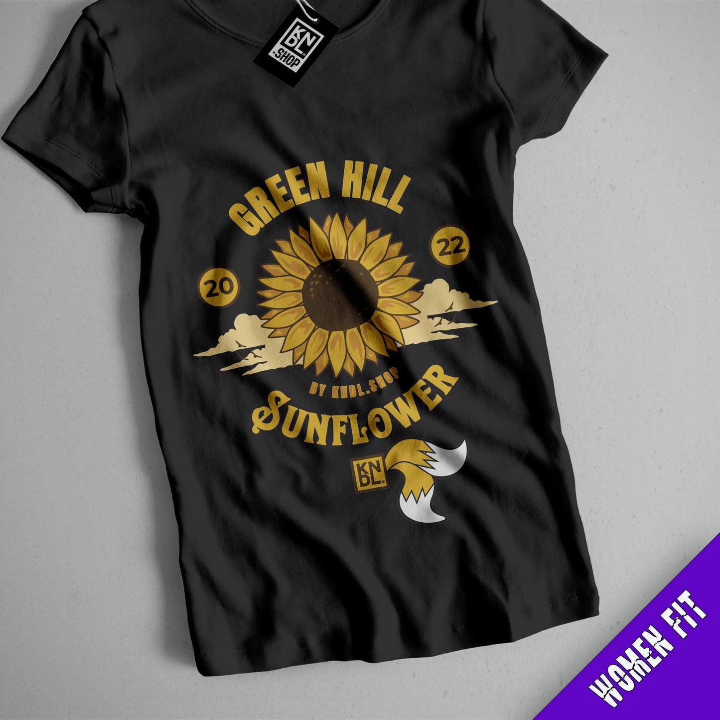 a black shirt with a sunflower on it