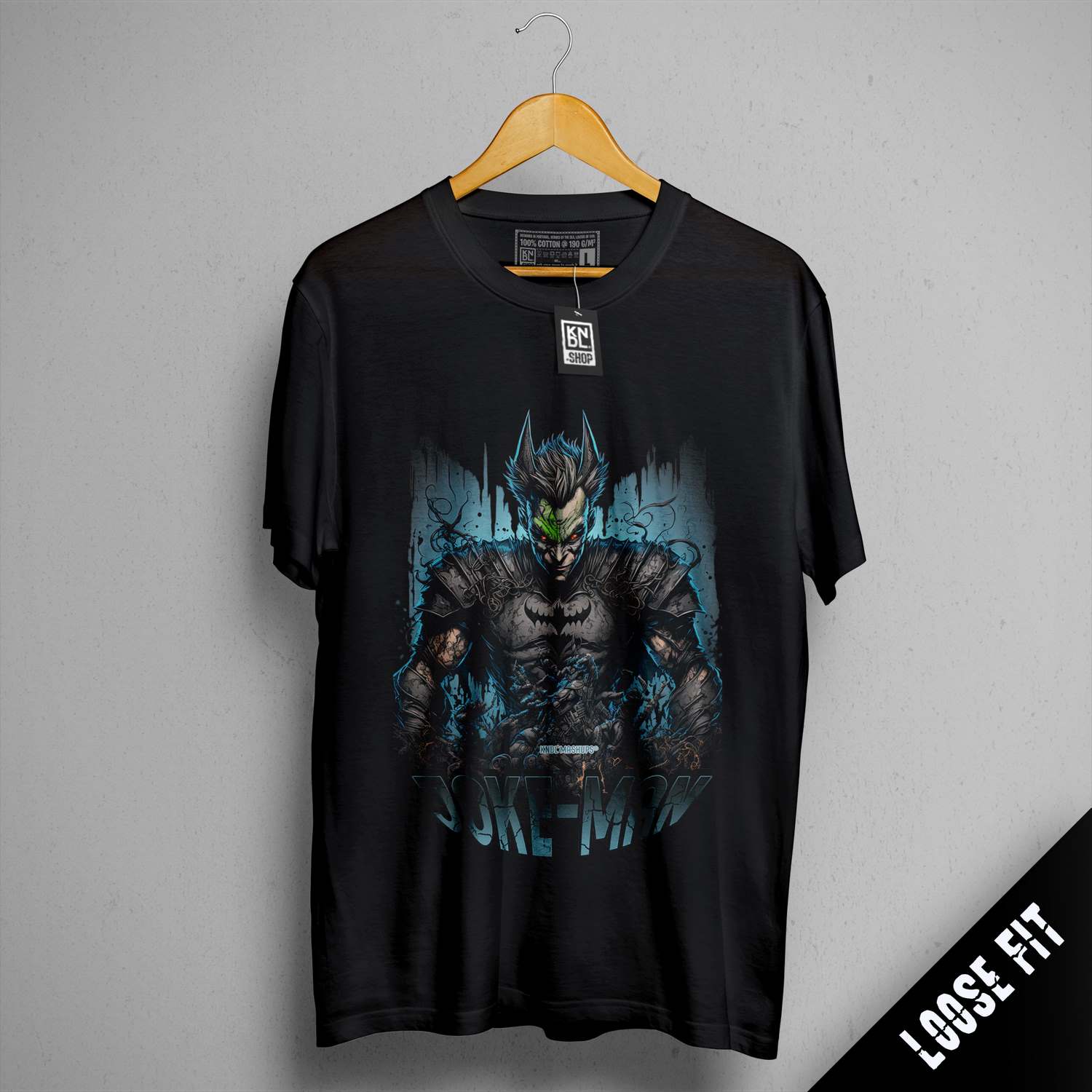 a black t - shirt with a picture of a batman on it