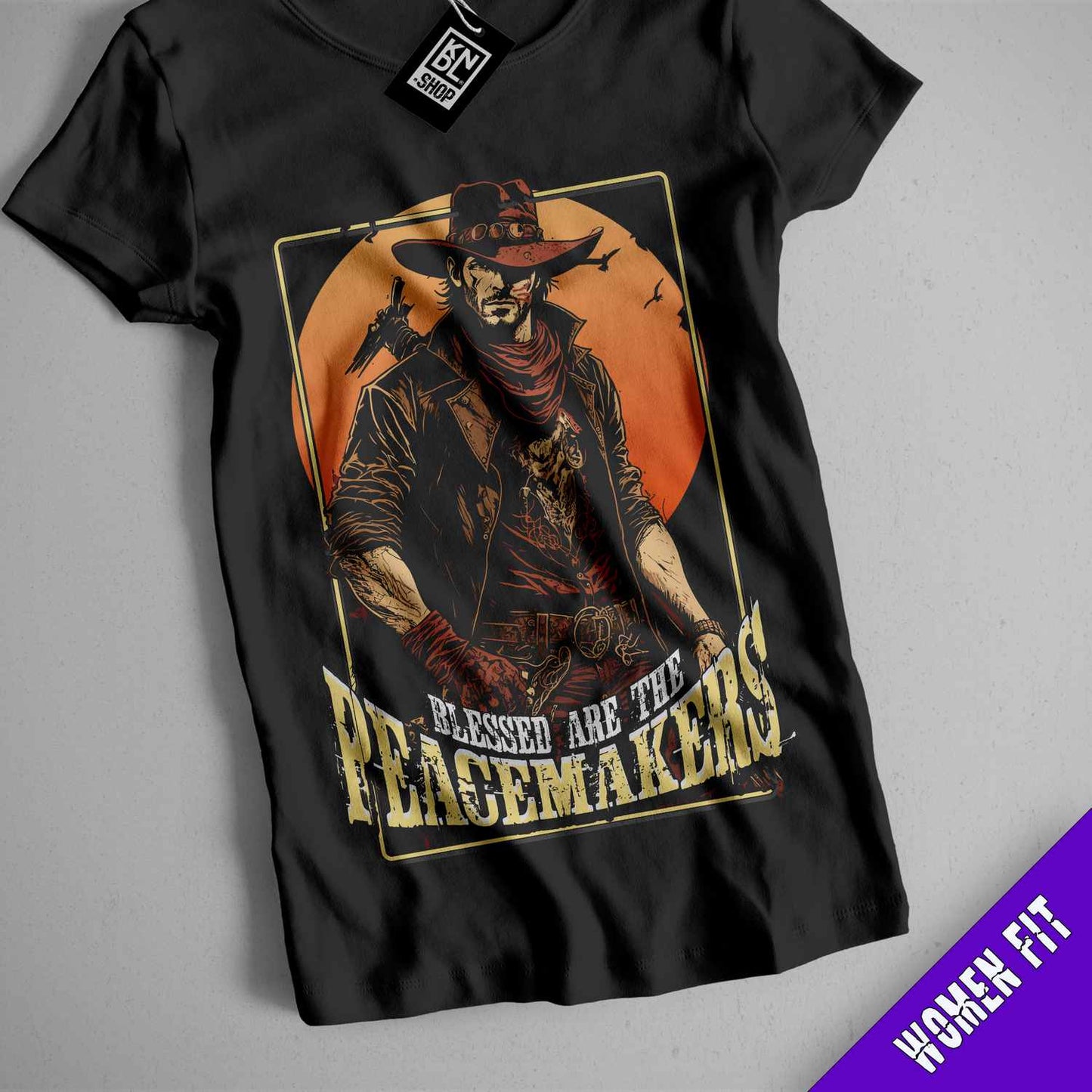 a black t - shirt with a picture of a skeleton wearing a cowboy hat