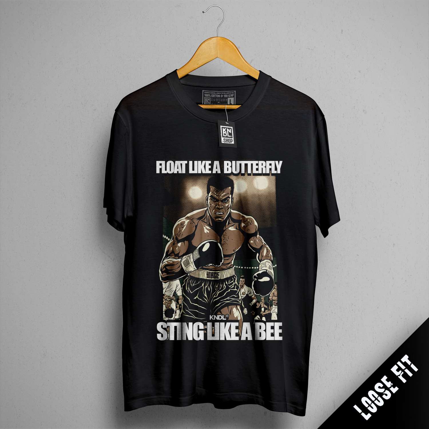 a t - shirt with a picture of a man in boxing gear
