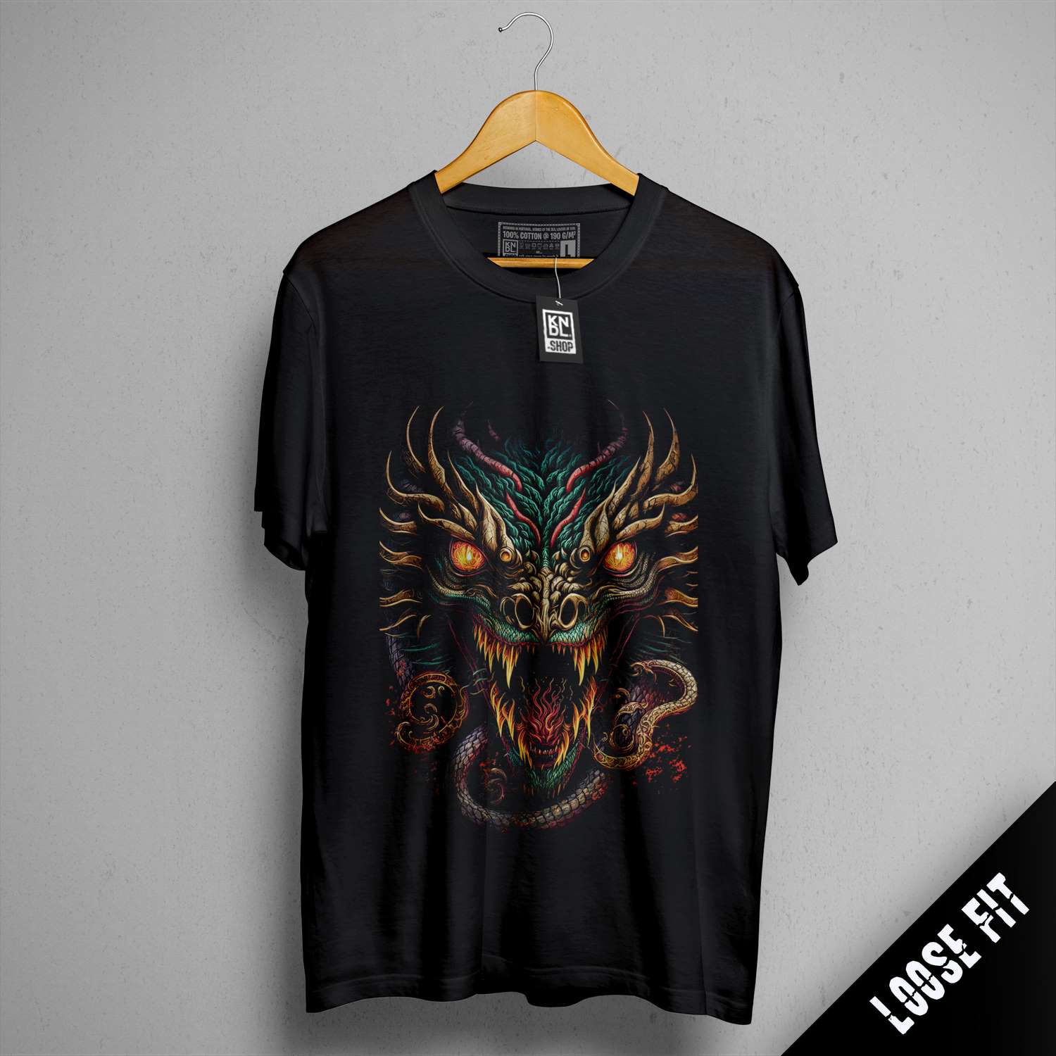 a black t - shirt with a dragon on it