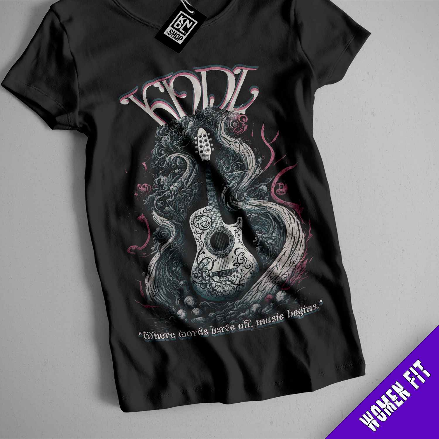 a black t - shirt with a skull and a guitar on it