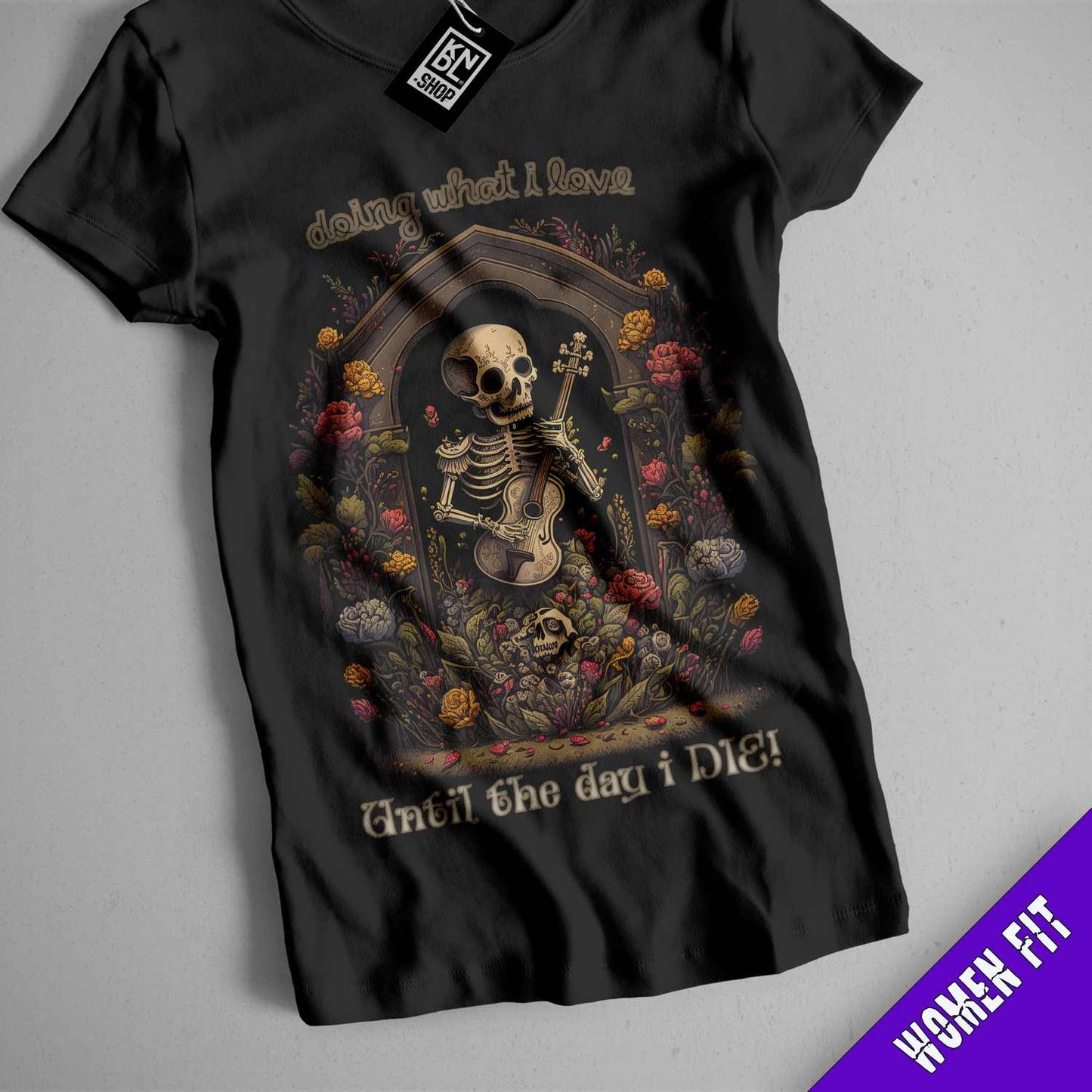 a black shirt with a skeleton holding a guitar