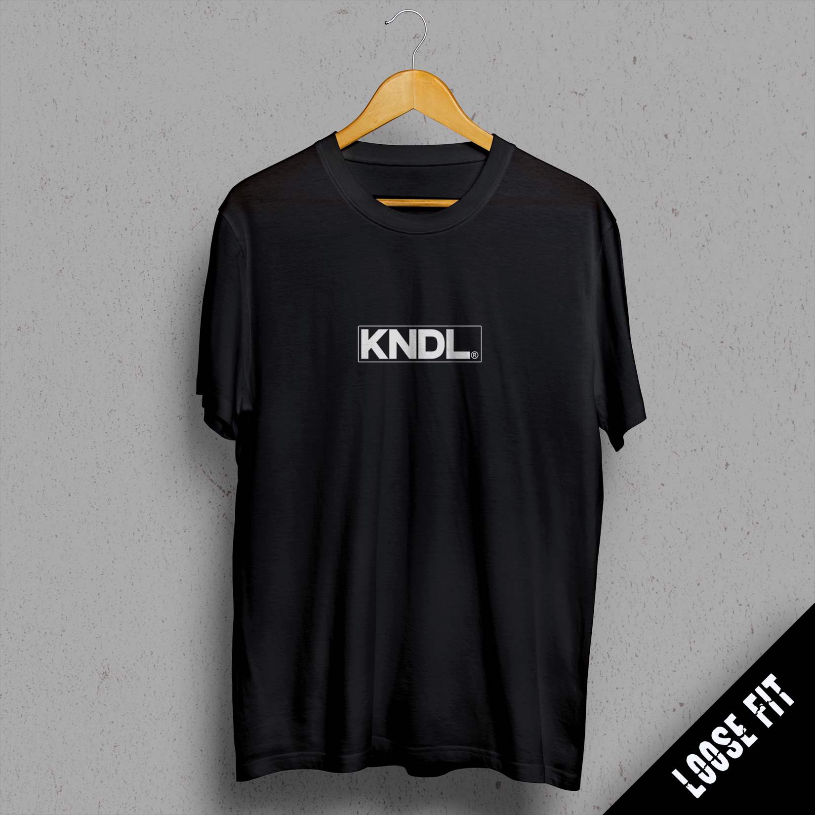 a black t - shirt with the words kindl printed on it