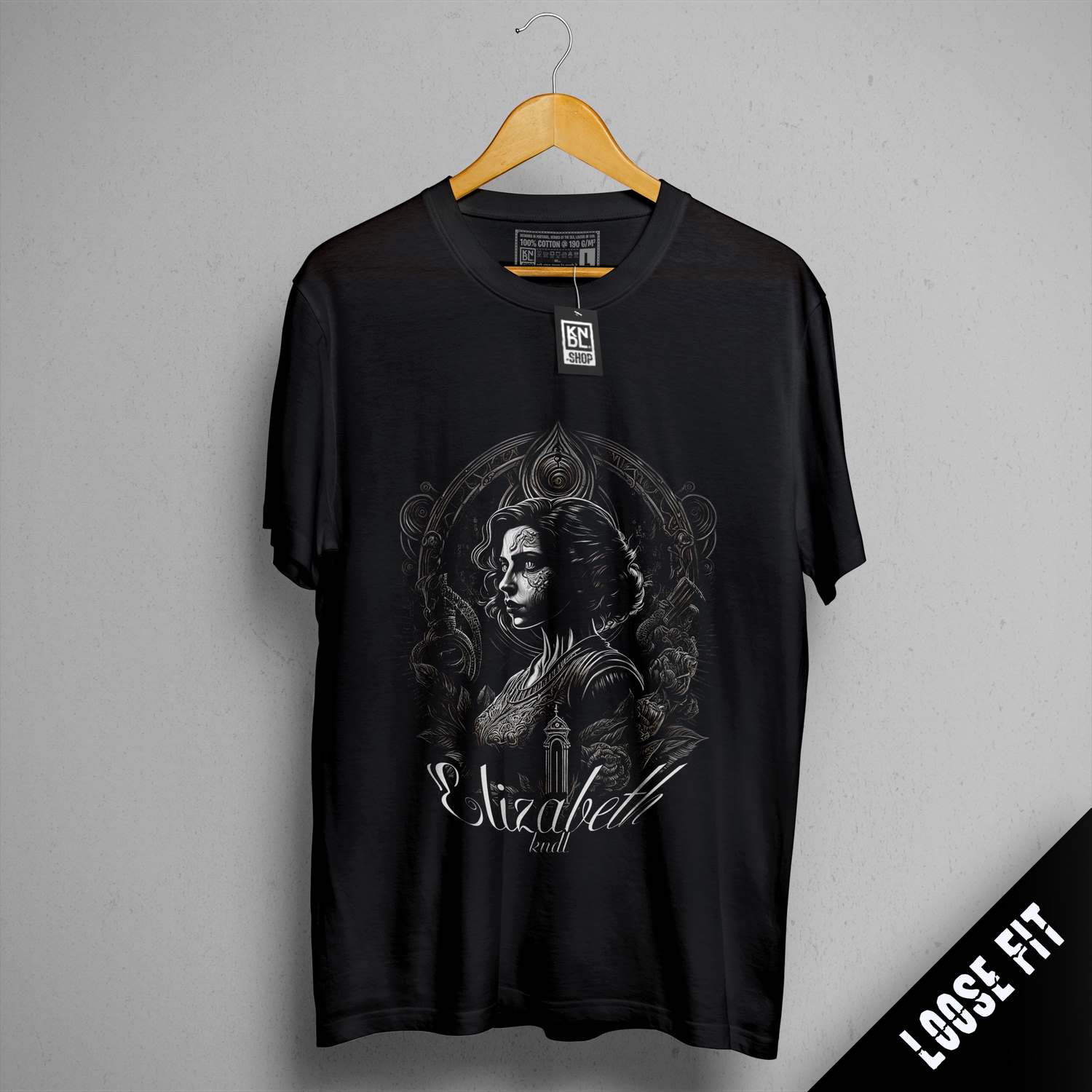 a black t - shirt with a picture of a woman on it