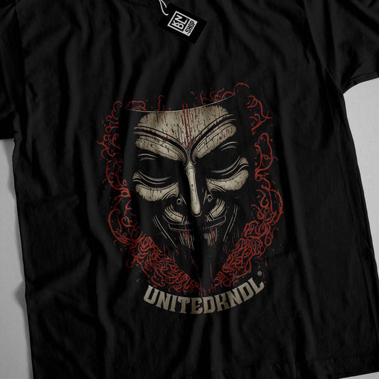 a black t - shirt with a mask on it