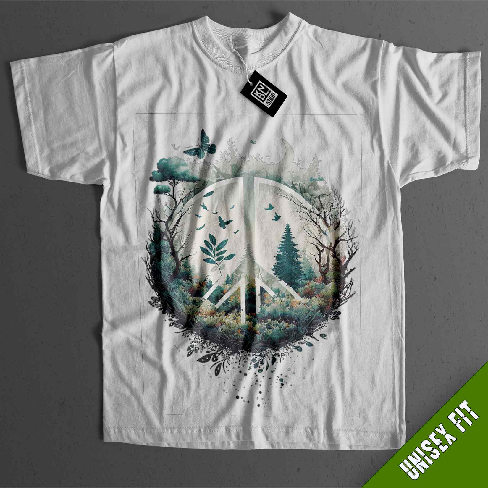 a white t - shirt with a forest scene on it