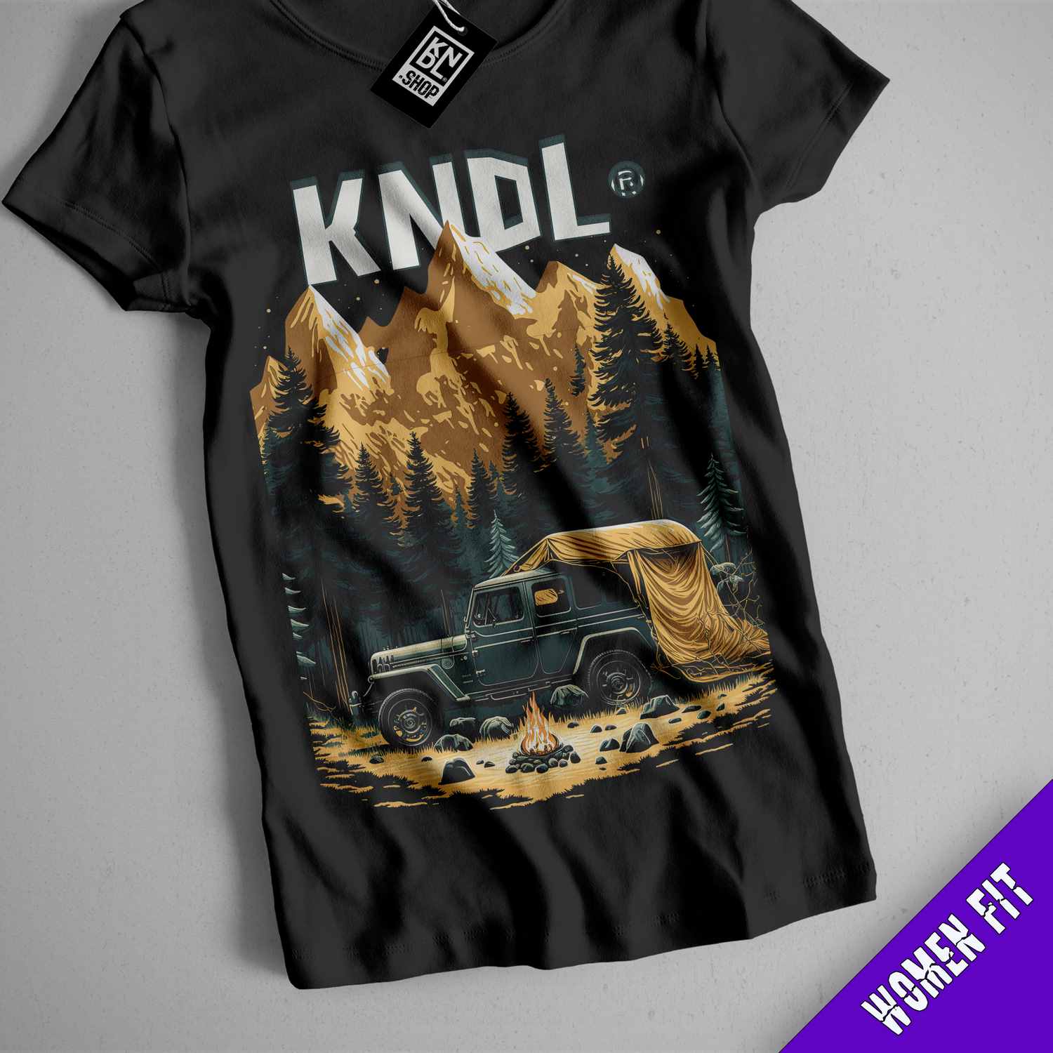 a black t - shirt with an image of a truck in the mountains