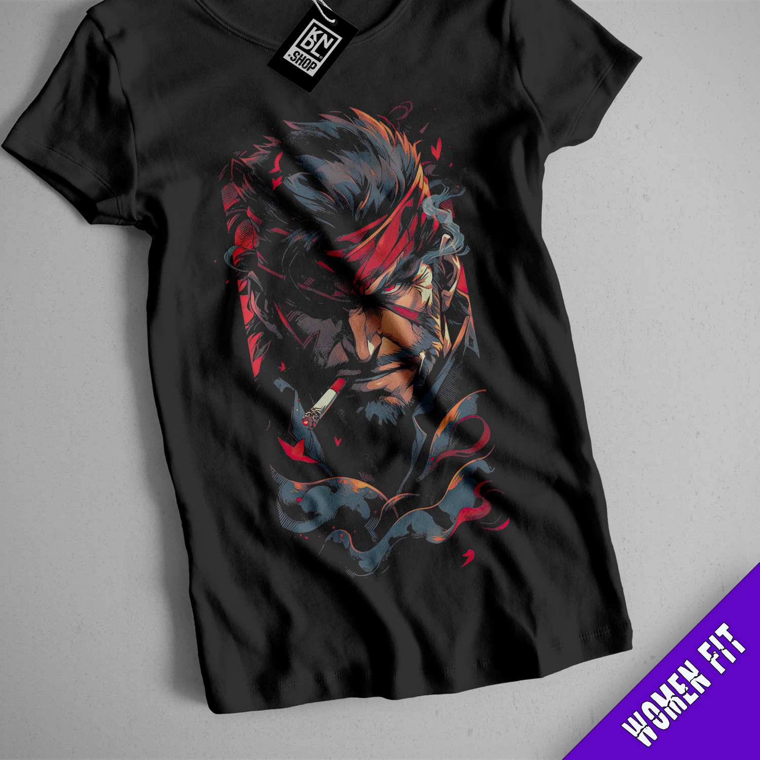a black t - shirt with a picture of a demon on it