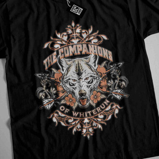 a black t - shirt with an image of a wolf on it