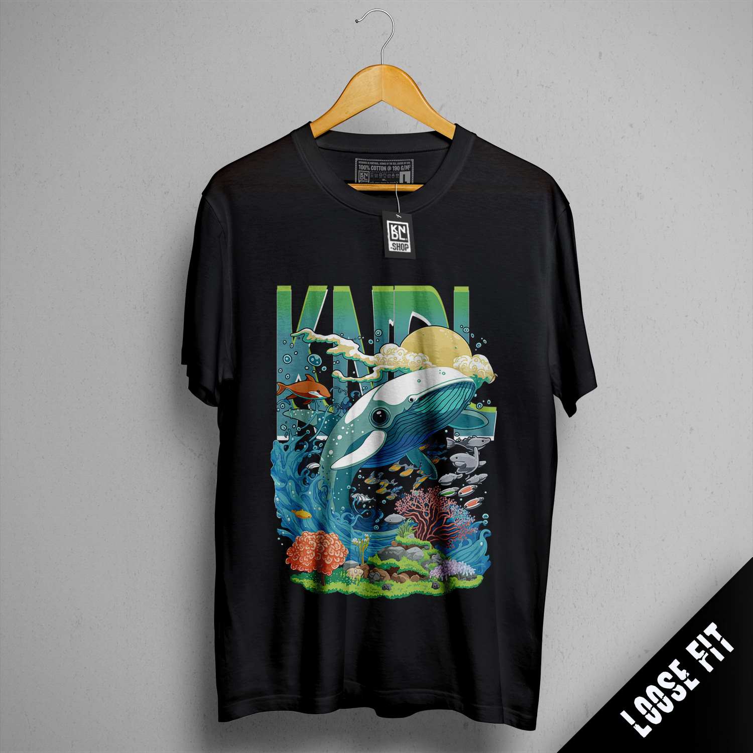 a black t - shirt with a picture of a dolphin and a fish on it