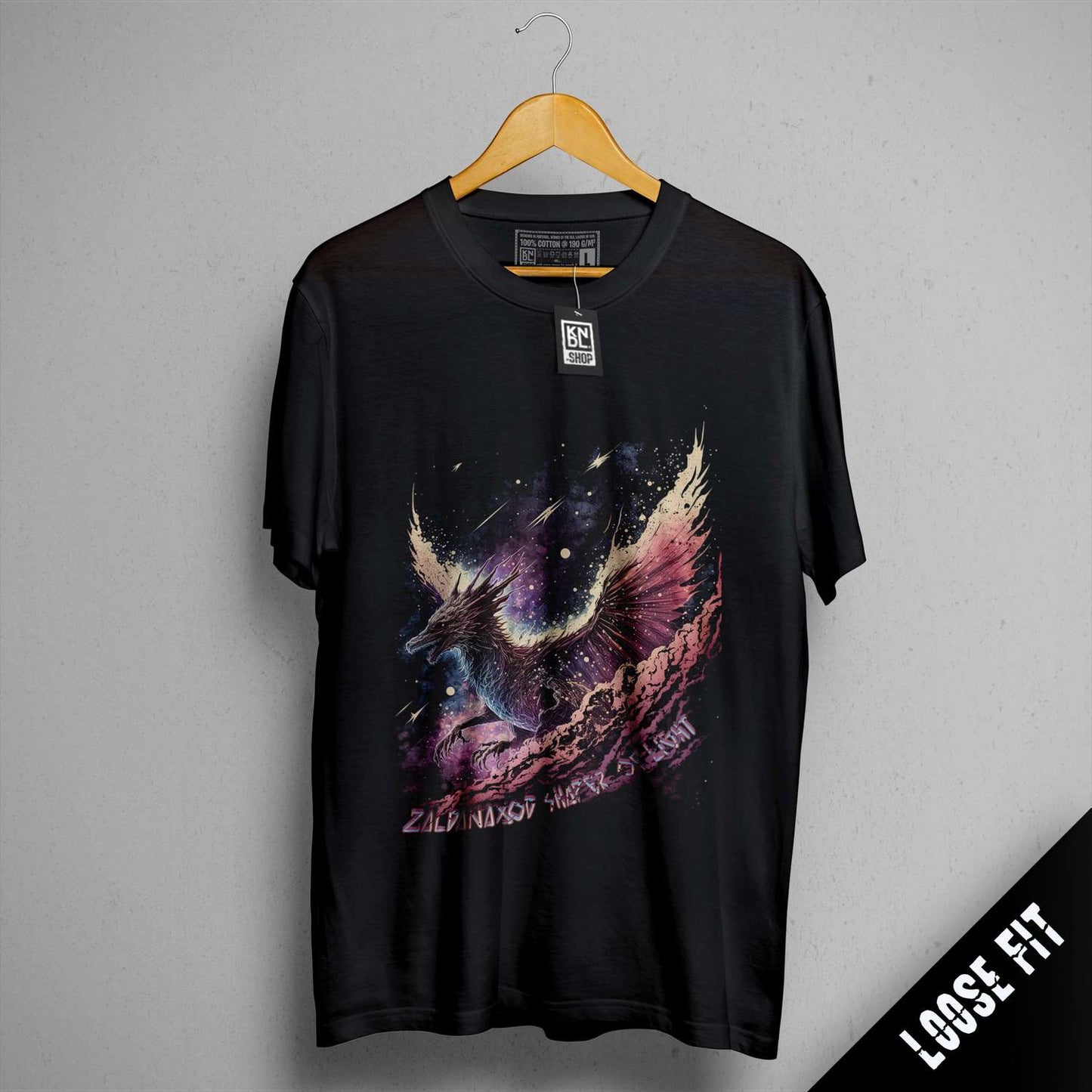 a black t - shirt with a picture of a dragon on it