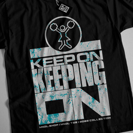 a t - shirt with the words keep on keeping on