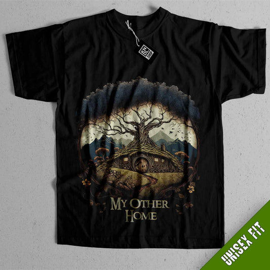 a black t - shirt with a picture of a tree and a house on it